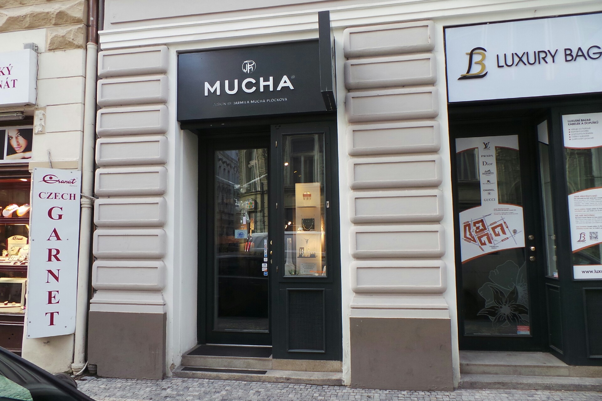 MUCHA JP Praha, spol. s r.o.