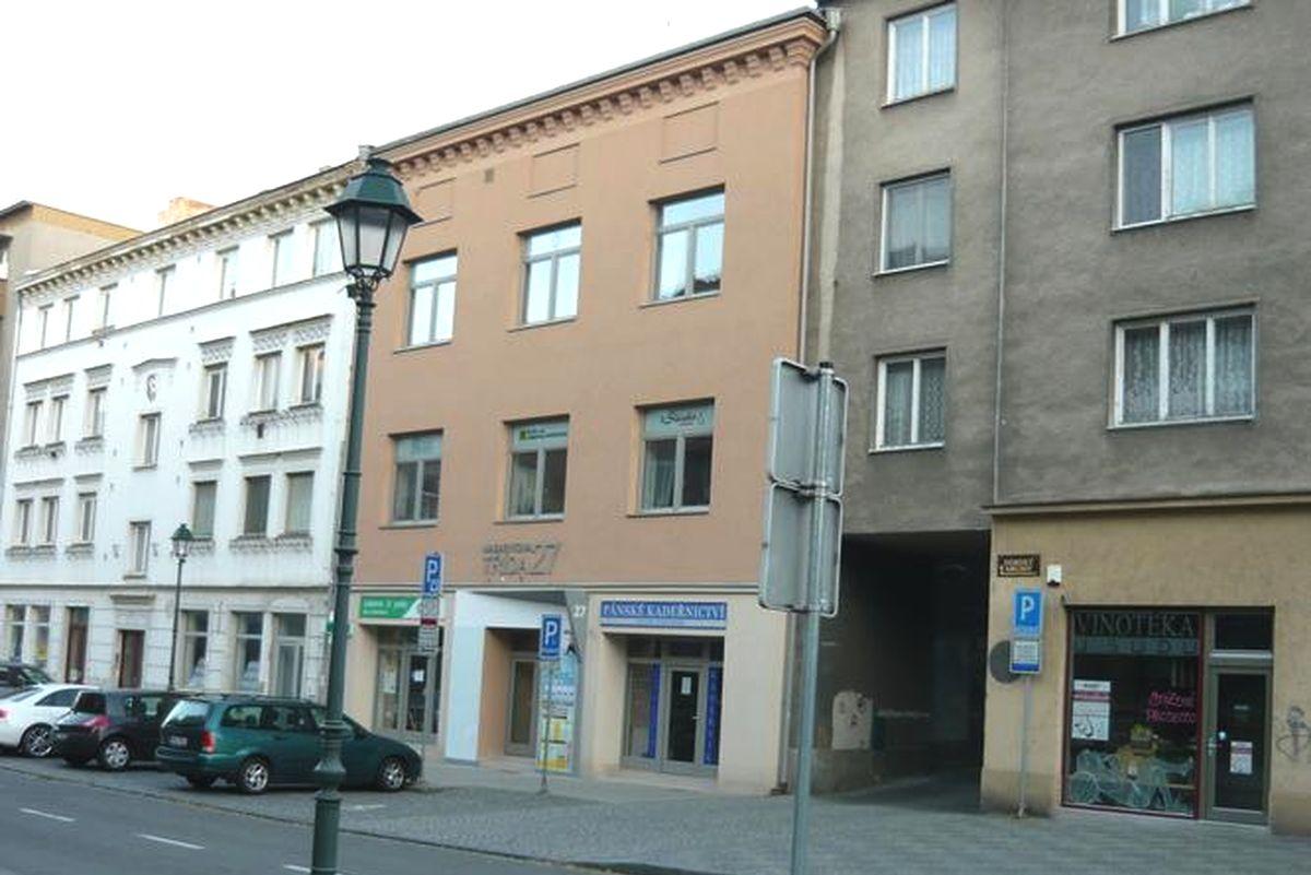 1. Slezská realitní, s.r.o.