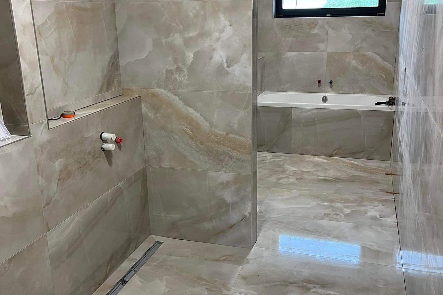 Adrian Jan Borycki - rekonstrukce koupelen