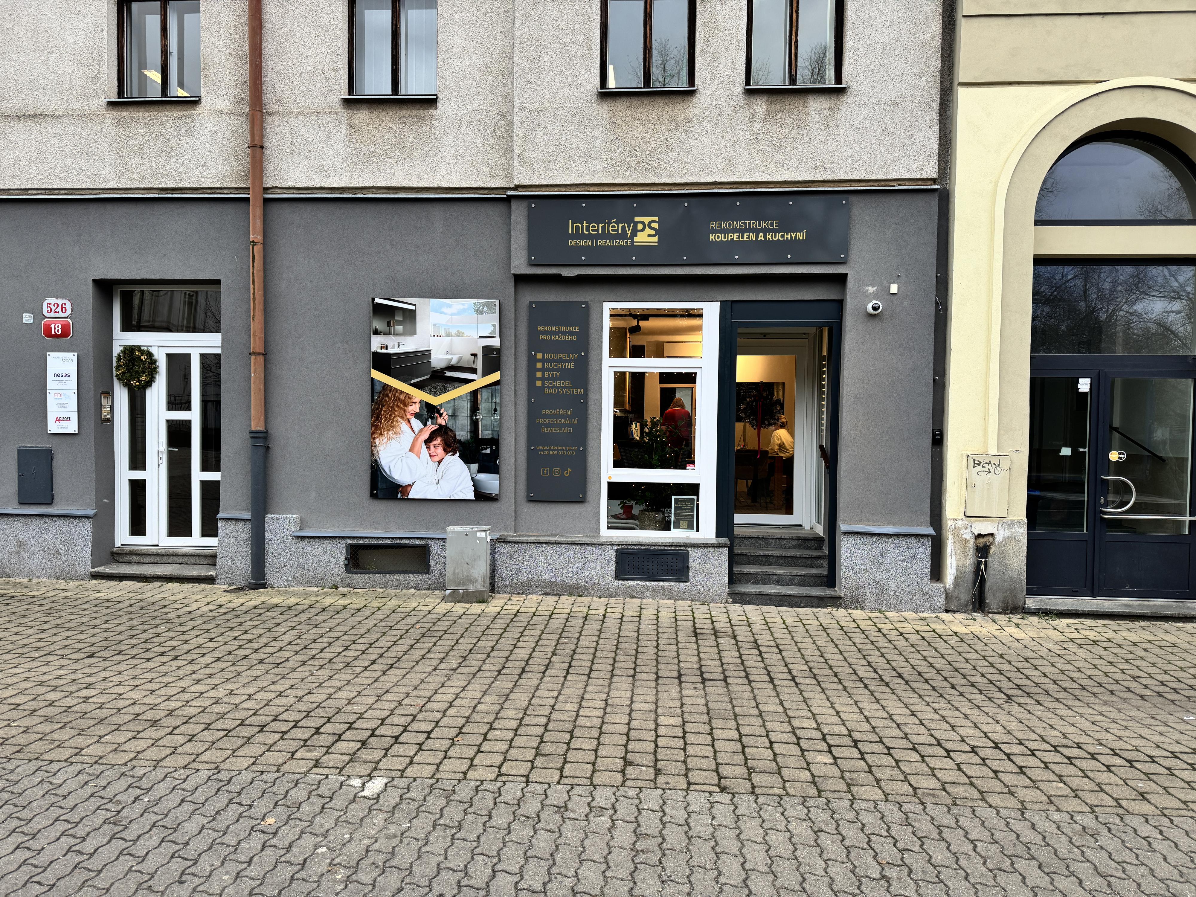 Interiéry PS s.r.o. -  rekonstrukce koupelen, kuchyní a celých bytů, stavební činnost foto 2