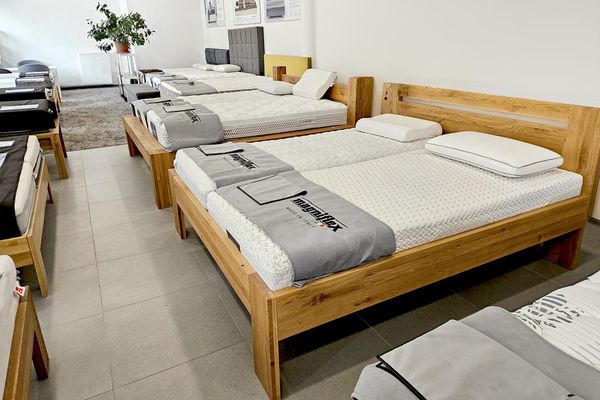 Wooden bed and mattress showroom