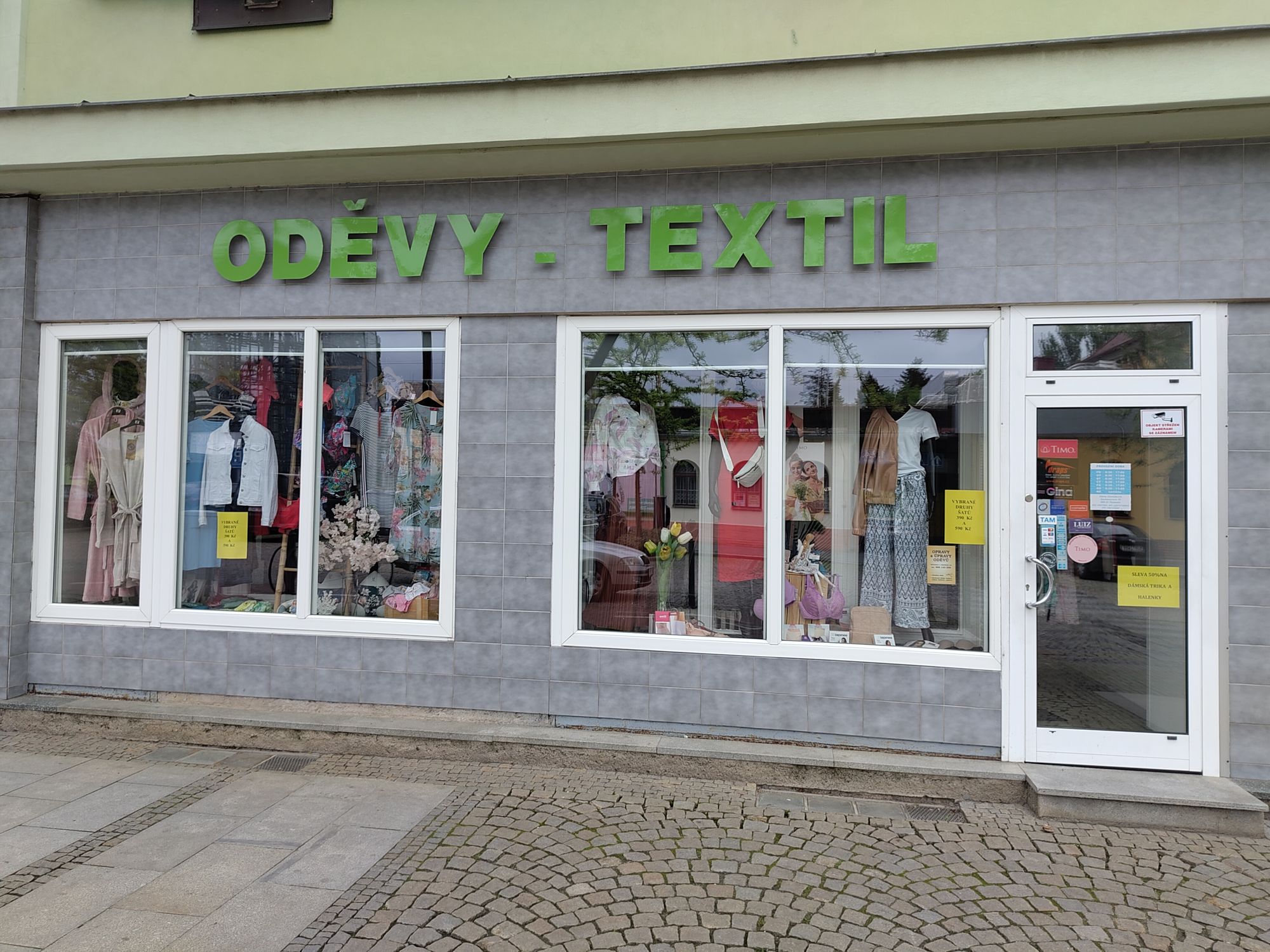 Oděvy a Textil Wilsonova