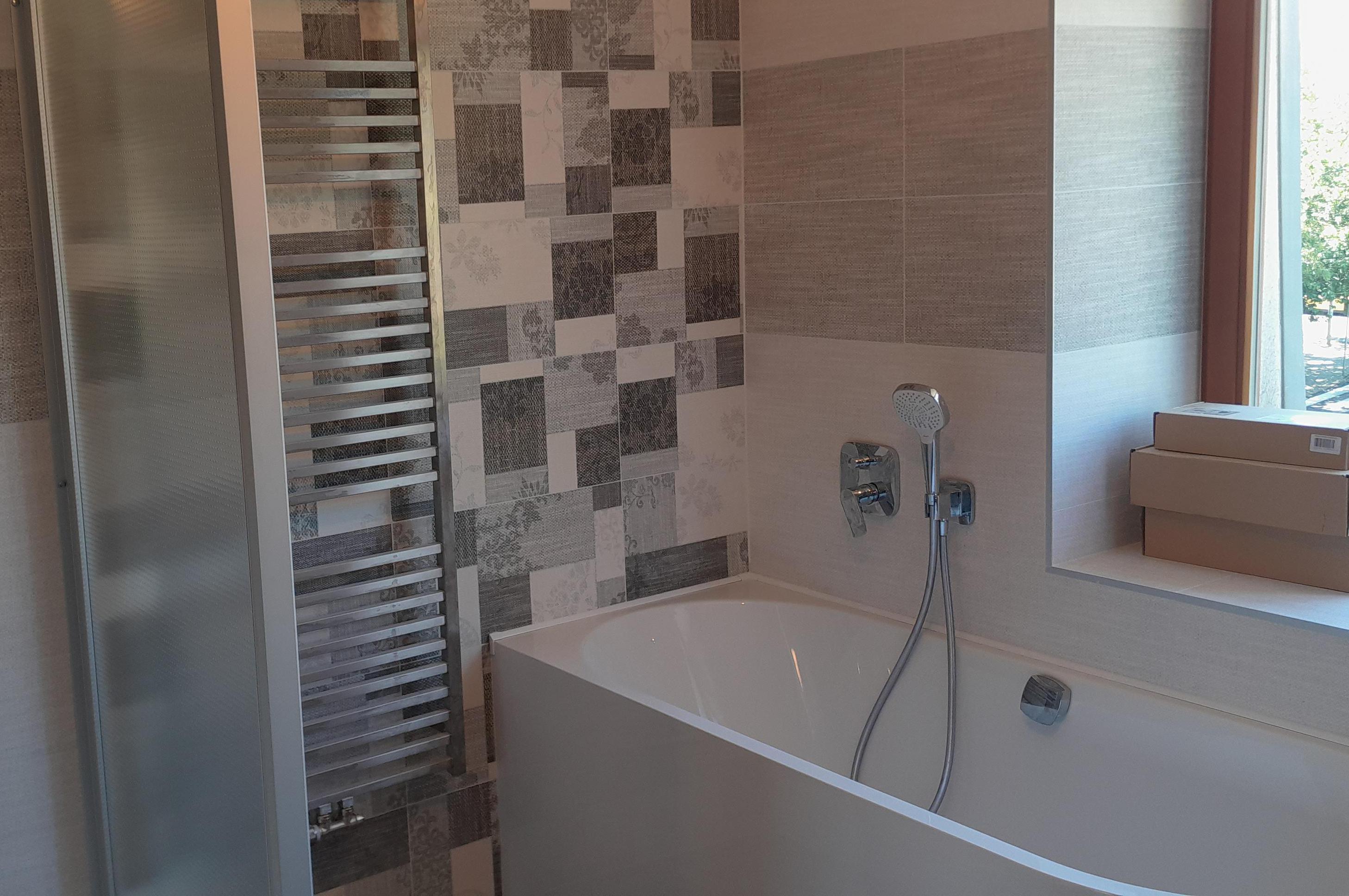 Rekonstrukce koupelen – Hodinový manžel Paluch