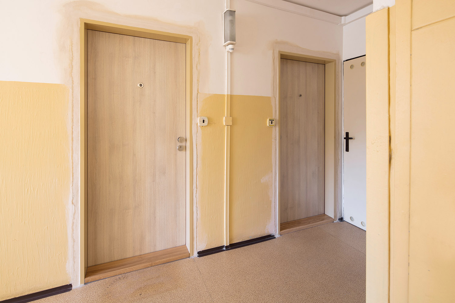 Otevírání zabouchnutých dveří v bytových domech