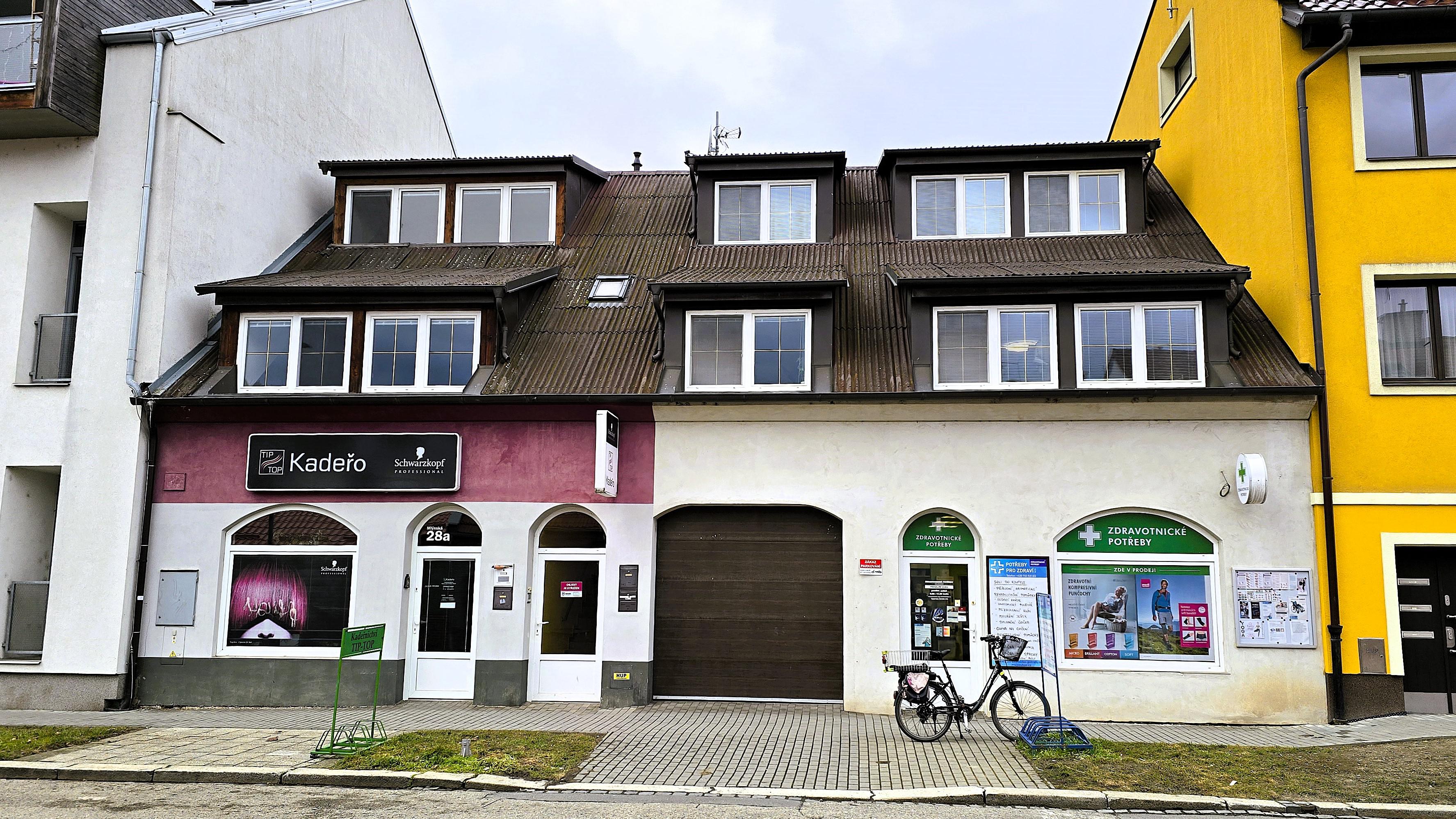 Kadeřnictví­ TIP - TOP