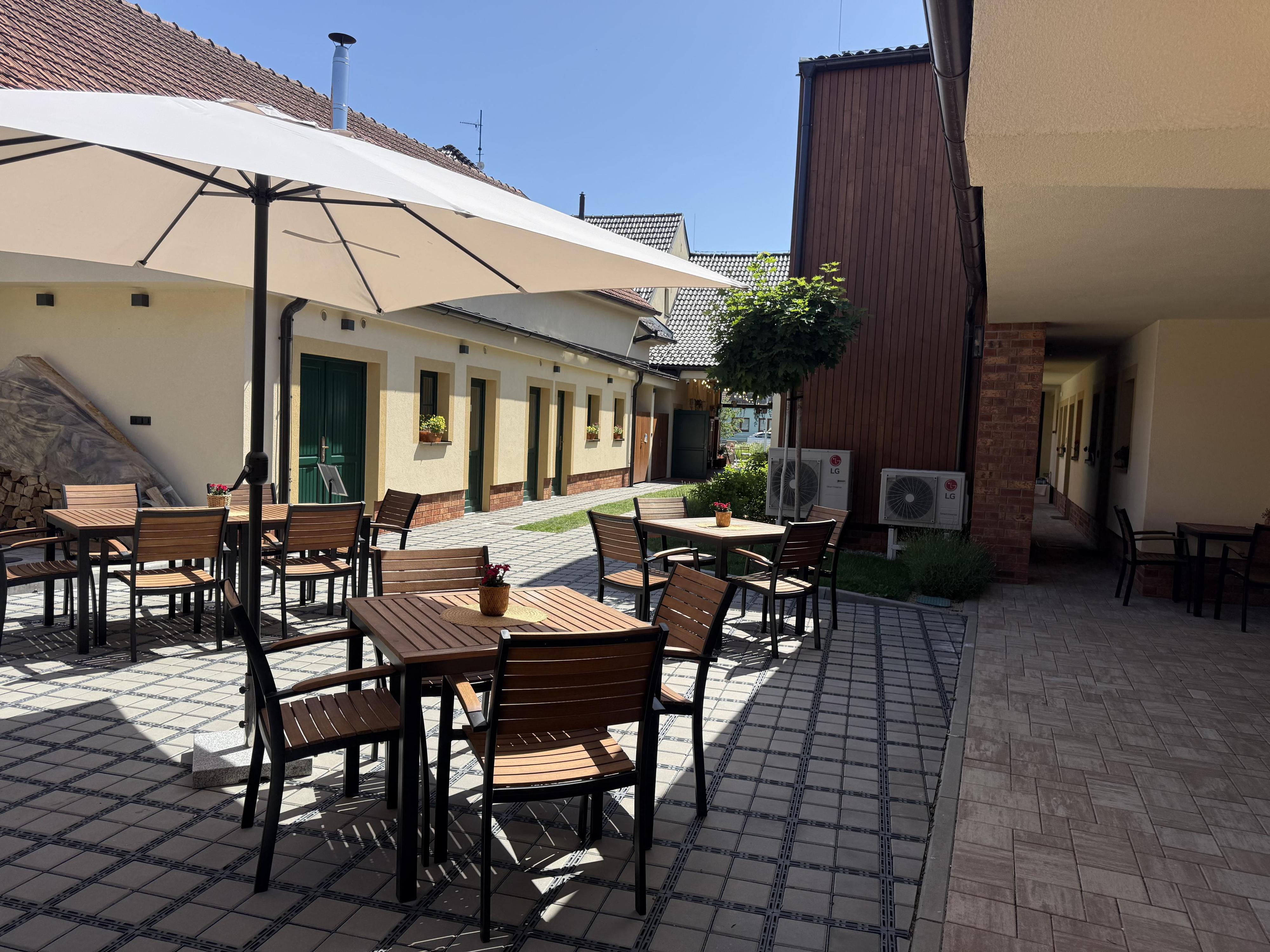 Apartmány v zahradě